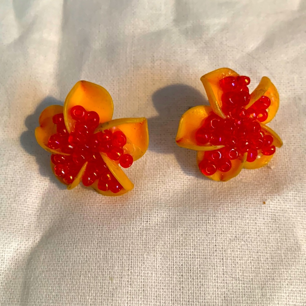 Adorable orange flower earrings.
